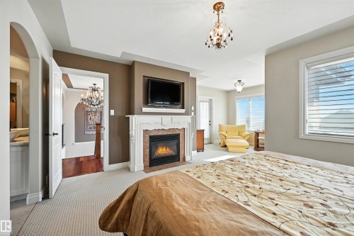 2426 Martell Crescent, Edmonton, AB - Indoor Photo Showing Bedroom With Fireplace