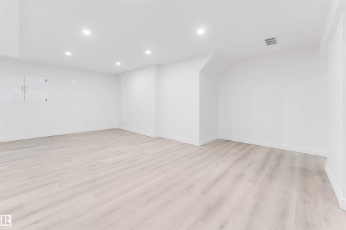 Bonus room with recessed lighting and light wood-type flooring - 14511 21 St., Edmonton, AB - Indoor Photo Showing Other Room