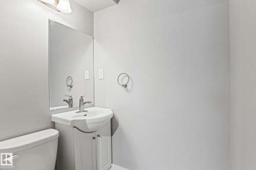 Bathroom with vanity and toilet - 914 9 Street, Cold Lake, AB - Indoor Photo Showing Bathroom