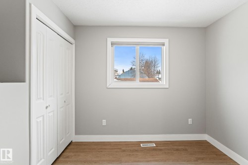 Unfurnished bedroom with light wood-type flooring and a closet - 914 9 Street, Cold Lake, AB - Indoor Photo Showing Other Room