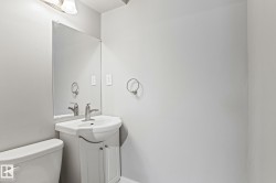 Bathroom with vanity and toilet - 