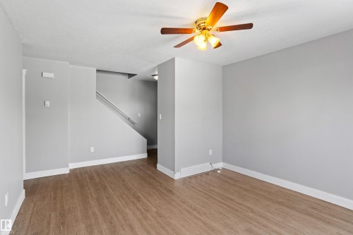 Empty room with light wood-type flooring and a ceiling fan - 914 9 Street, Cold Lake, AB - Indoor Photo Showing Other Room