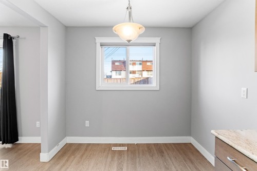 Unfurnished dining area featuring light wood finished floors and baseboards - 914 9 Street, Cold Lake, AB - Indoor Photo Showing Other Room