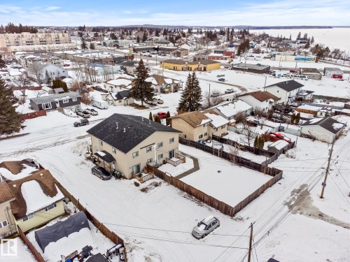 Snowy aerial view with a residential view - 914 9 Street, Cold Lake, AB - Outdoor With View