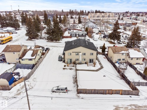 Snowy aerial view with a residential view - 914 9 Street, Cold Lake, AB - Outdoor With View