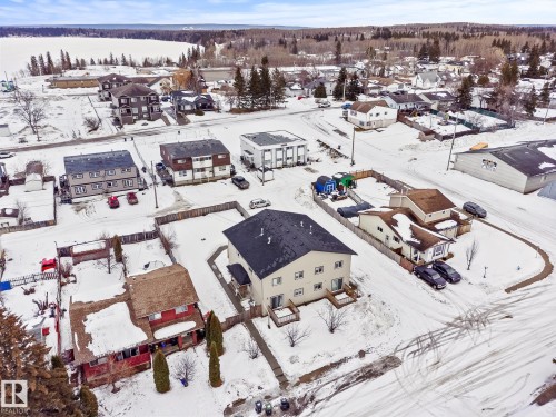 Snowy aerial view with a residential view - 914 9 Street, Cold Lake, AB - Outdoor With View