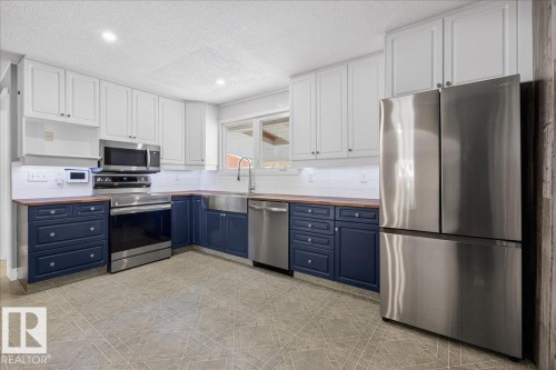 28 Afton Crescent, St. Albert, AB - Indoor Photo Showing Kitchen With Stainless Steel Kitchen