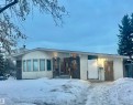 View of front facade with brick siding and a chimney - 11 Austin Crescent, St. Albert, AB  - Outdoor 