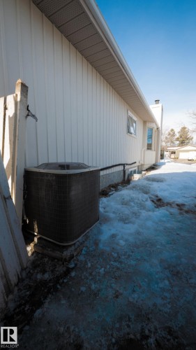 Snow covered property with a central air condition unit - 11 Austin Crescent, St. Albert, AB - Outdoor With Exterior