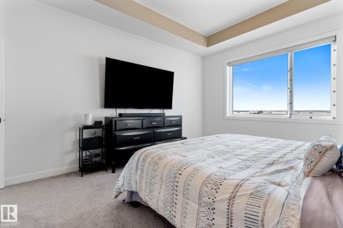Bedroom featuring light colored carpet and baseboards - 342 Meadowview Drive, Fort Saskatchewan, AB - Indoor Photo Showing Bedroom