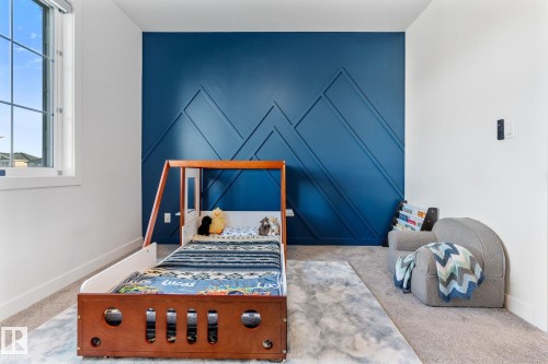 Bedroom with carpet floors and baseboards - 342 Meadowview Drive, Fort Saskatchewan, AB - Indoor Photo Showing Bedroom