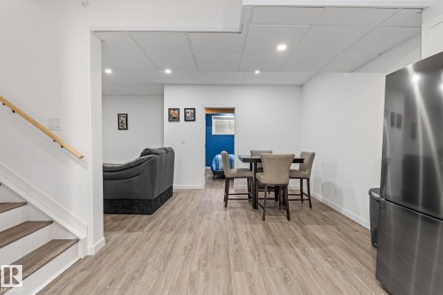 Dining room with a paneled ceiling, recessed lighting, and light wood-type flooring - 342 Meadowview Drive, Fort Saskatchewan, AB - Indoor