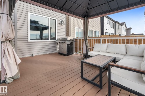 Wooden deck with outdoor lounge area, area for grilling, and a gazebo - 342 Meadowview Drive, Fort Saskatchewan, AB - Outdoor With Deck Patio Veranda With Exterior