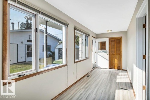 View of unfurnished sunroom - 4314 52 Street, Wetaskiwin, AB -  With Exterior