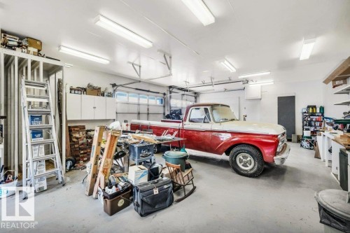 View of garage - 4314 52 Street, Wetaskiwin, AB - Indoor Photo Showing Garage