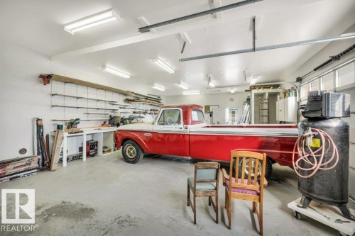View of garage - 4314 52 Street, Wetaskiwin, AB - Indoor Photo Showing Garage