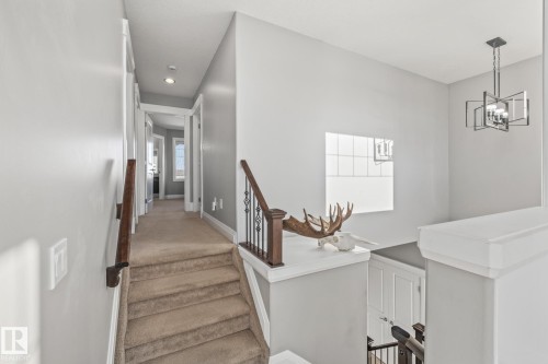 Staircase featuring baseboards - 167 Bremner Crescent, Fort Saskatchewan, AB - Indoor Photo Showing Other Room