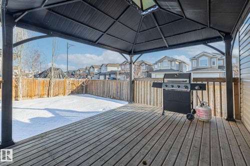 Deck with a residential view, a fenced backyard, and area for grilling - 167 Bremner Crescent, Fort Saskatchewan, AB - Outdoor With Deck Patio Veranda