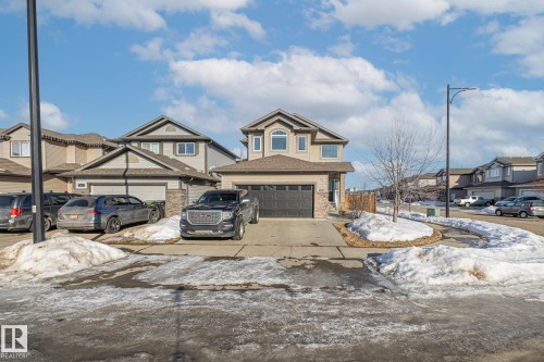 View of front of home featuring a residential view and concrete driveway - 167 Bremner Crescent, Fort Saskatchewan, AB - Outdoor With Facade