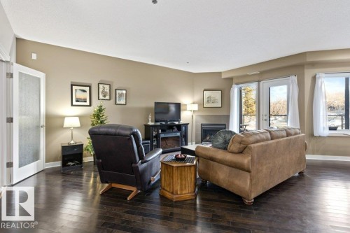 219 35 Sturgeon Road, St. Albert, AB - Indoor Photo Showing Living Room With Fireplace
