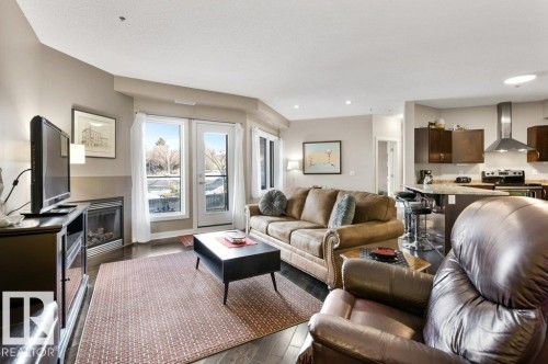 219 35 Sturgeon Road, St. Albert, AB - Indoor Photo Showing Living Room With Fireplace