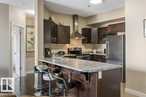 219 35 Sturgeon Road, St. Albert, AB - Indoor Photo Showing Kitchen With Stainless Steel Kitchen With Double Sink