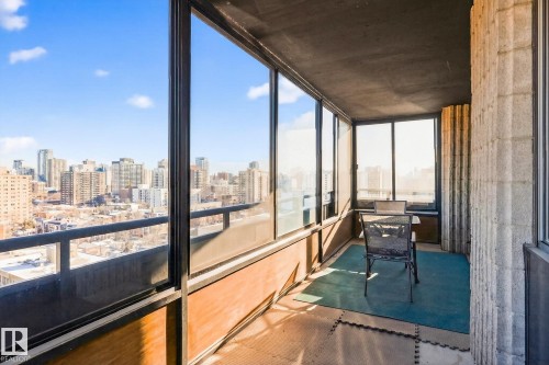 Sunroom featuring a view of skyline - 1502 10160 115 Street, Edmonton, AB -  With Balcony With Exterior