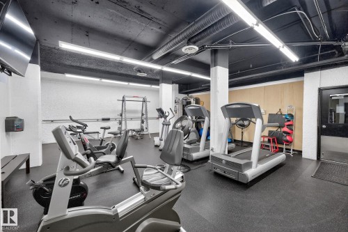 Workout area featuring a textured wall - 1502 10160 115 Street, Edmonton, AB - Indoor Photo Showing Gym Room
