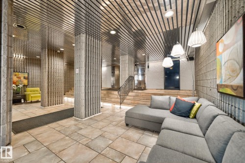 Community lobby with stairway and recessed lighting - 1502 10160 115 Street, Edmonton, AB - Indoor Photo Showing Other Room