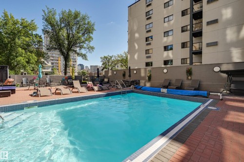 Community pool featuring a patio - 1502 10160 115 Street, Edmonton, AB - Outdoor With In Ground Pool With Backyard
