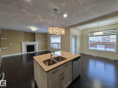 1737 52A Street, Edmonton, AB - Indoor Photo Showing Kitchen With Fireplace With Double Sink
