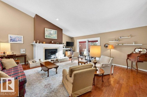 12 500 Lessard Drive, Edmonton, AB - Indoor Photo Showing Living Room With Fireplace