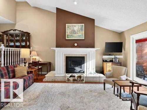 12 500 Lessard Drive, Edmonton, AB - Indoor Photo Showing Living Room With Fireplace