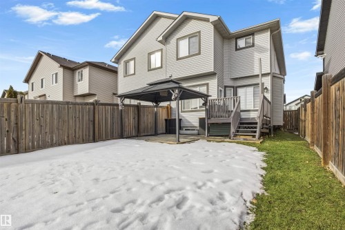 Rear view of property with a fenced backyard, a gazebo, and a patio area - 1965 118 Street, Edmonton, AB - Outdoor