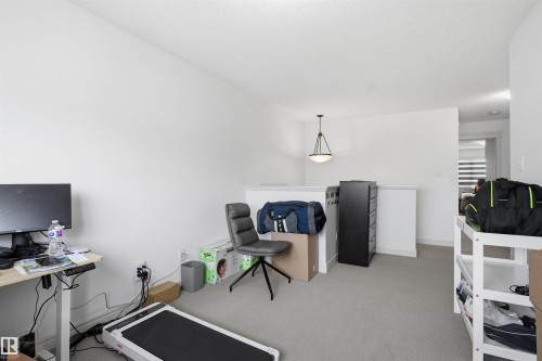 Home office featuring light colored carpet and baseboards - 1965 118 Street, Edmonton, AB - Indoor