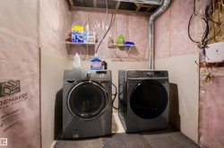 Laundry area featuring washing machine and dryer - 
