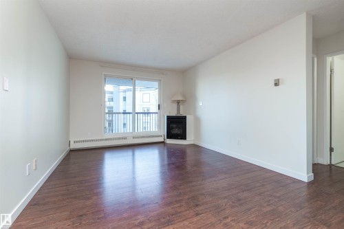 458 10520 120 Street, Edmonton, AB - Indoor With Fireplace