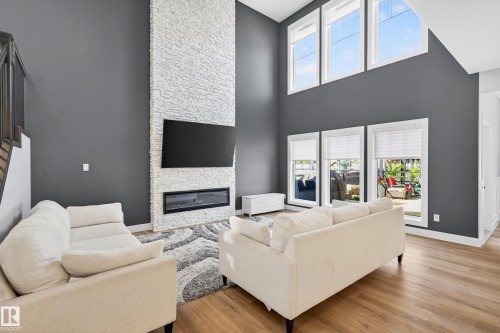 3912 Ginsburg Crescent, Edmonton, AB - Indoor Photo Showing Living Room With Fireplace