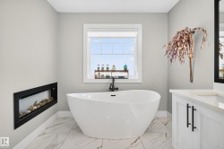 Enjoy long luxurious baths in your incredible soaker tub by the fireplace - 