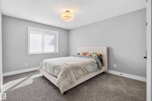 Bedroom #3 on 2nd floor - 3912 Ginsburg Crescent, Edmonton, AB - Indoor Photo Showing Bedroom