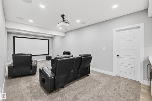 Theatre room with surround sound - 3912 Ginsburg Crescent, Edmonton, AB - Indoor Photo Showing Other Room