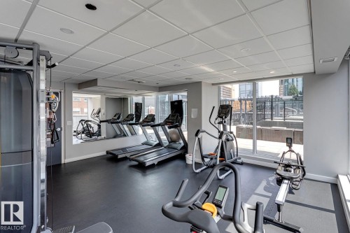 Exercise room featuring a drop ceiling - 3300 10180 103 Street, Edmonton, AB - Indoor Photo Showing Gym Room