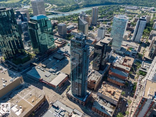 Aerial view of property and surrounding area featuring nearby urban area and a large body of water - 3300 10180 103 Street, Edmonton, AB - Outdoor With View