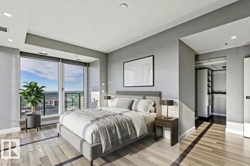 Bedroom with recessed lighting and light wood-type flooring - 3300 10180 103 Street, Edmonton, AB - Indoor Photo Showing Bedroom