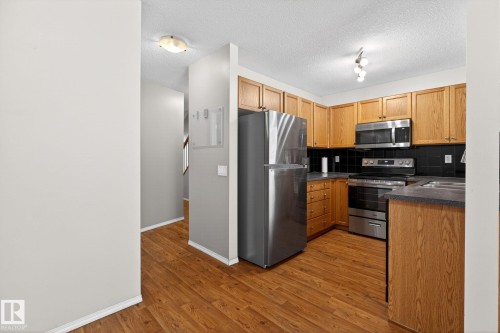 108 150 Edwards Drive, Edmonton, AB - Indoor Photo Showing Kitchen With Stainless Steel Kitchen