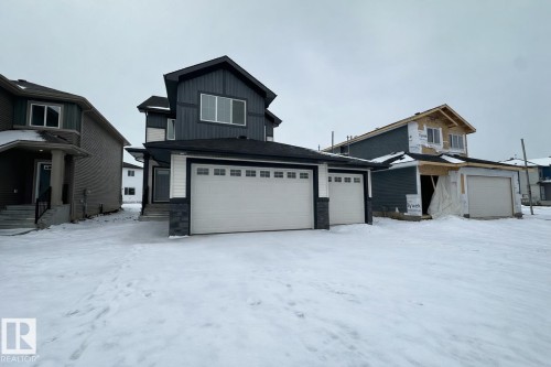 223 Ravine Drive, Devon, AB - Outdoor With Facade