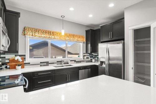 17630 61A Street, Edmonton, AB - Indoor Photo Showing Kitchen With Stainless Steel Kitchen With Double Sink With Upgraded Kitchen