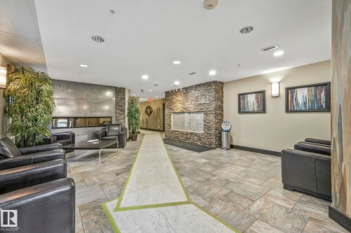 202 9707 106 Street, Edmonton, AB - Indoor With Fireplace