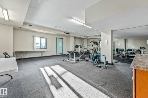 202 9707 106 Street, Edmonton, AB - Indoor Photo Showing Gym Room