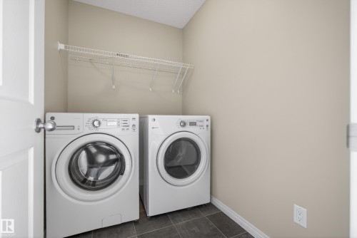 2786 Coughlan Green, Edmonton, AB - Indoor Photo Showing Laundry Room